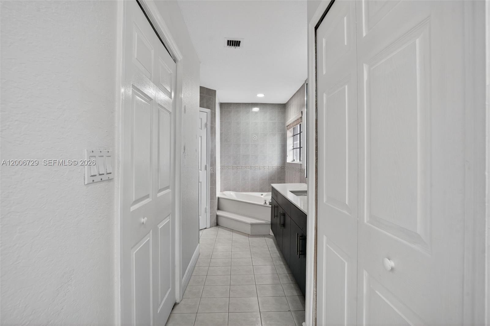 14251 Southwest 34th Street Miami, FL 33175 - Photo 27 of 54 a bathroom with a sink and a shower