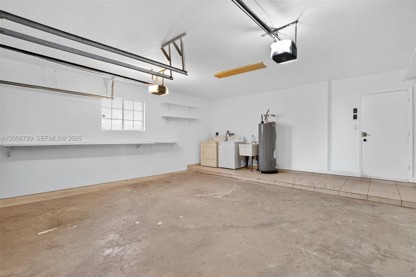 14251 Southwest 34th Street Miami, FL 33175 - Photo 41 of 54 a view of empty room with wooden floor and fan