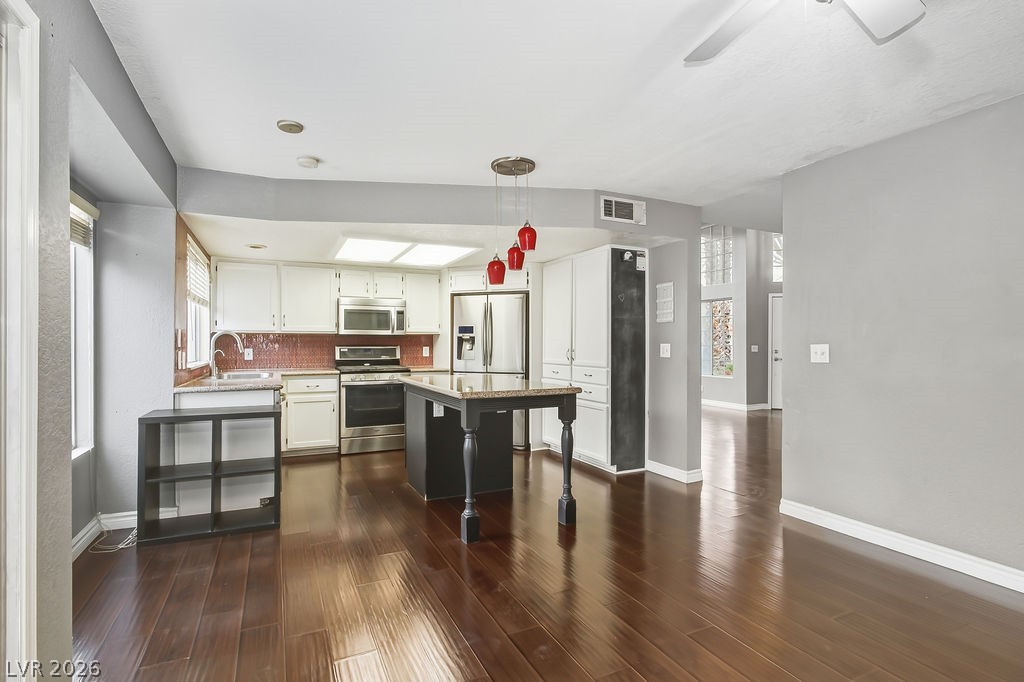 863 Brass Ring Road Las Vegas, NV 89123 - Photo 24 of 47 Kitchen with island and breakfast table area
