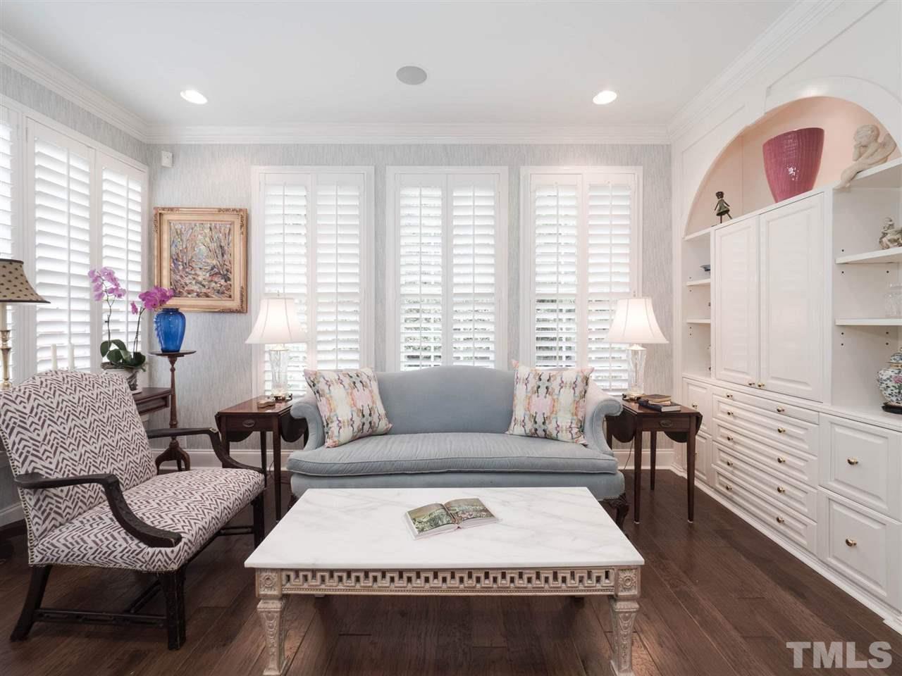 3521 Barron Berkeley Way Raleigh, NC 27612 - Photo 11 of 30 a living room with furniture and a couch