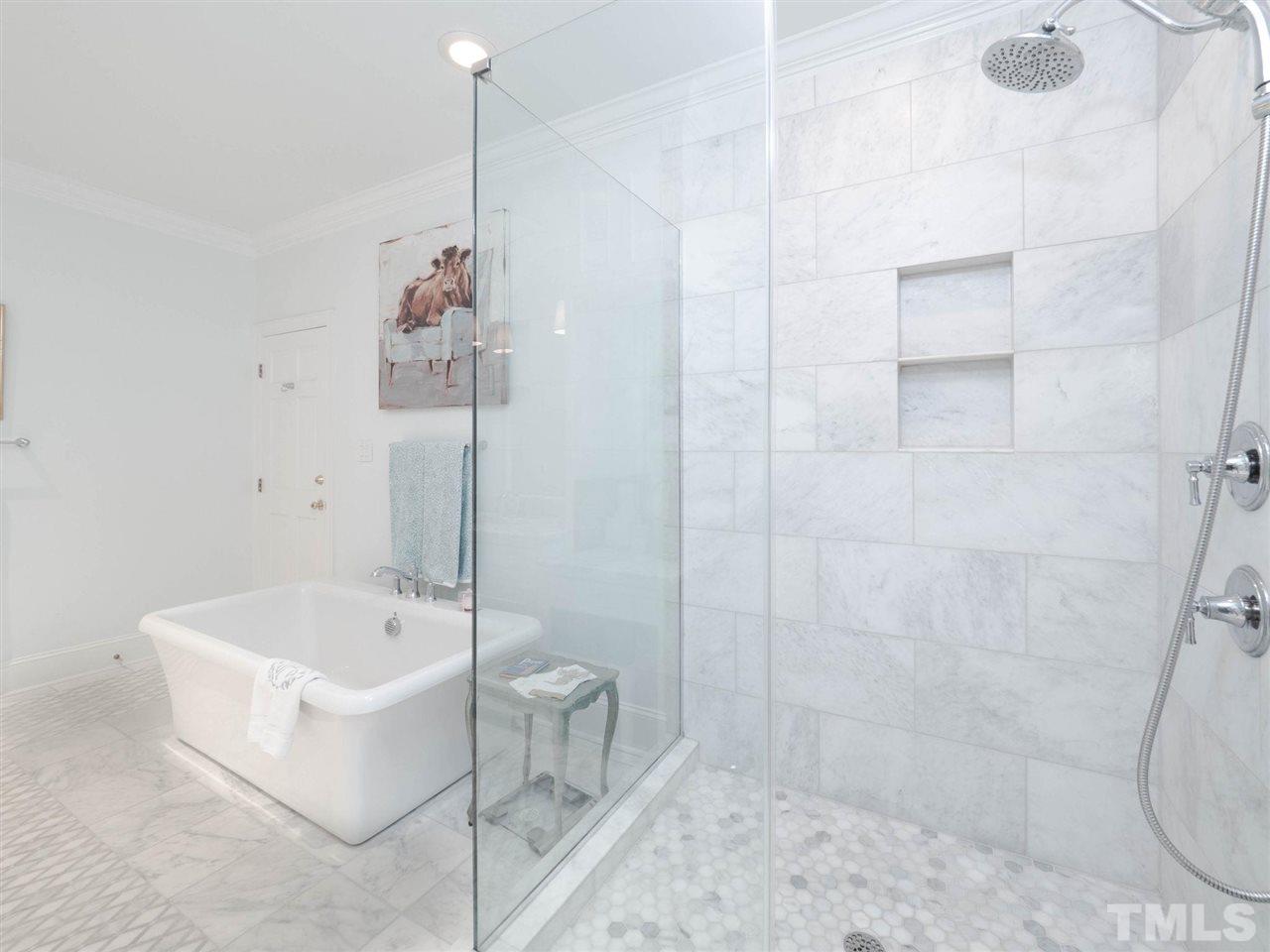 3521 Barron Berkeley Way Raleigh, NC 27612 - Photo 21 of 30 a bathroom with a sink a toilet and shower