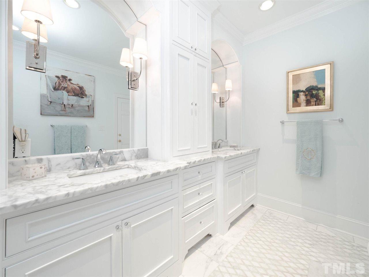 3521 Barron Berkeley Way Raleigh, NC 27612 - Photo 22 of 30 a bathroom with a granite countertop double vanity sink and a mirror