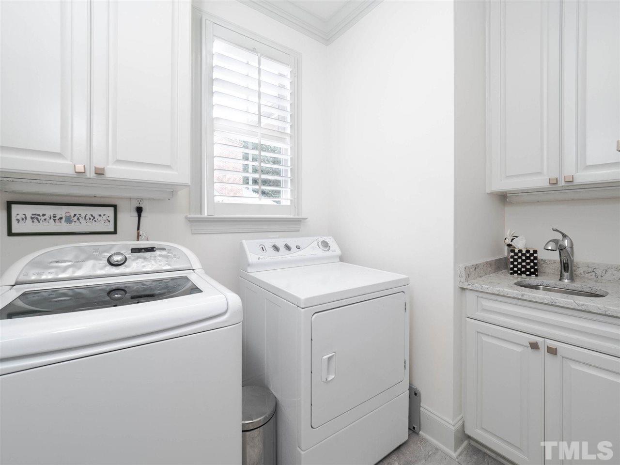 3521 Barron Berkeley Way Raleigh, NC 27612 - Photo 26 of 30 a utility room with dryer and washer