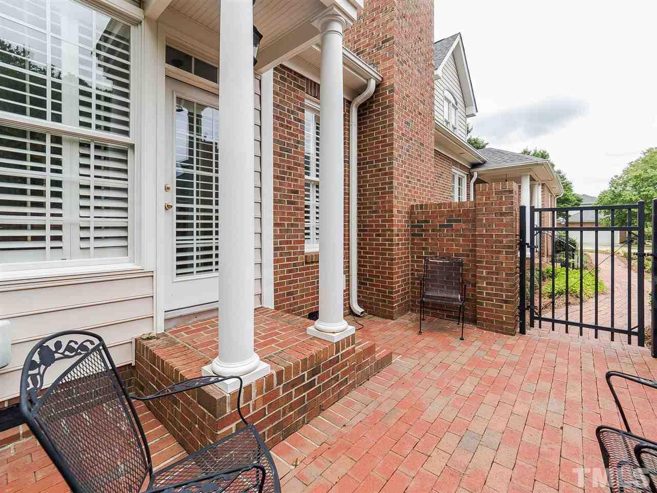 3521 Barron Berkeley Way Raleigh, NC 27612 - Photo 28 of 30 a view of a balcony with a couple of chairs