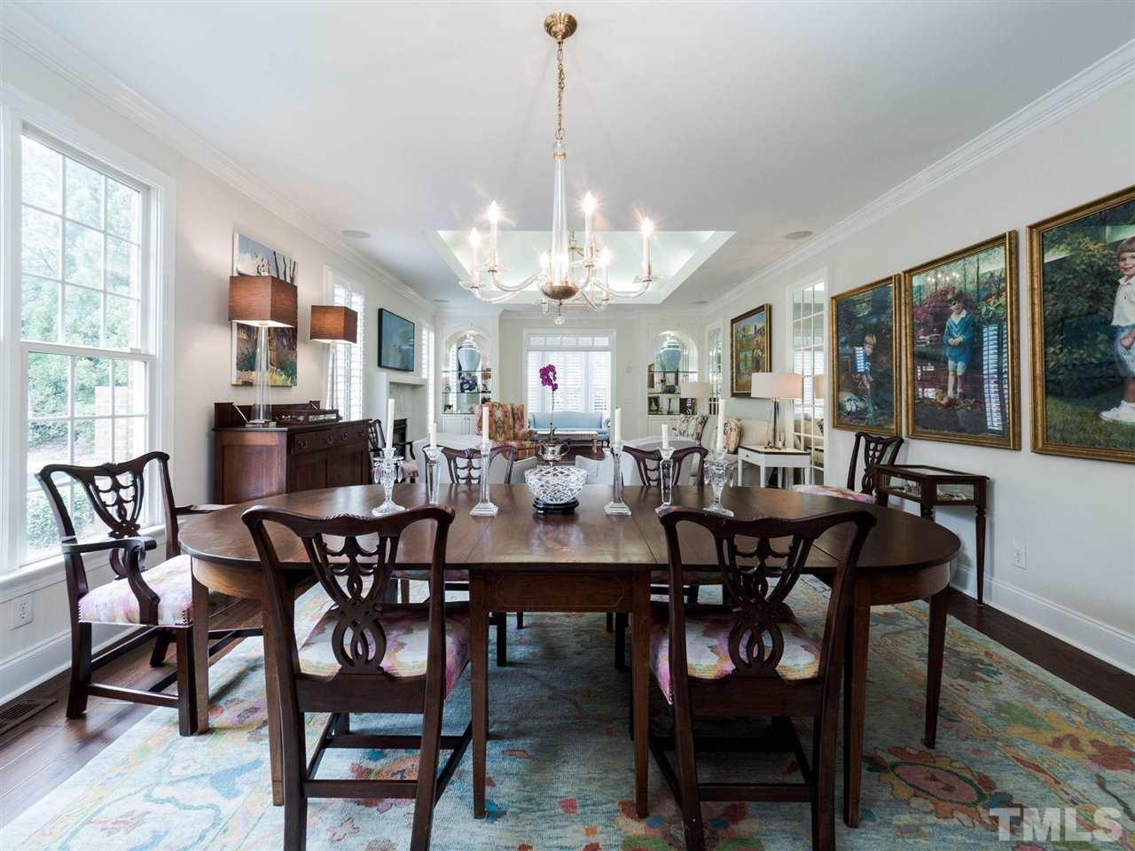 3521 Barron Berkeley Way Raleigh, NC 27612 - Photo 6 of 30 a view of a dining room with furniture window and wooden floor