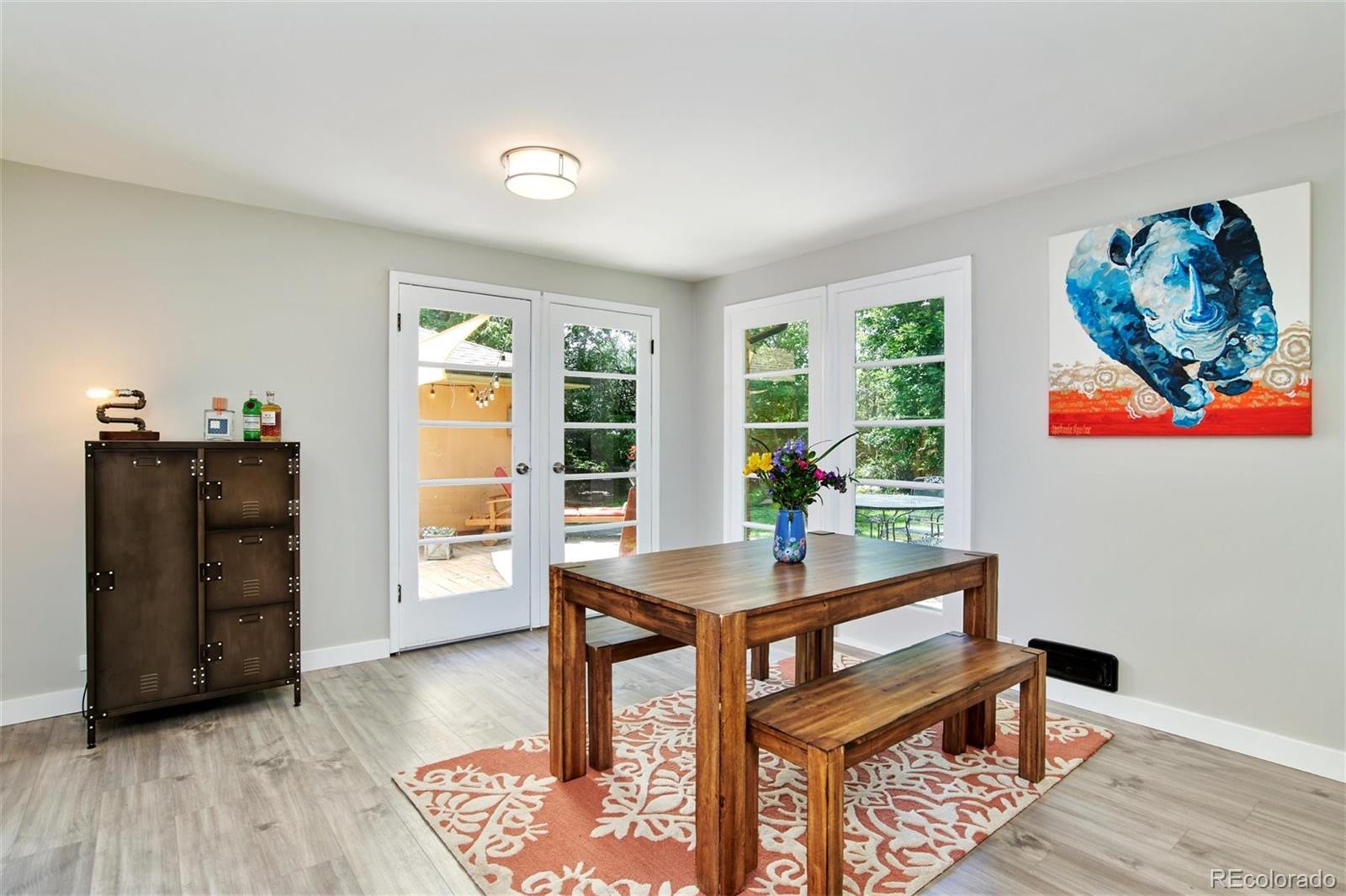 3225 Vance Street Wheat Ridge, CO 80033 - Photo 11 of 29 a view of a workspace with furniture and a window