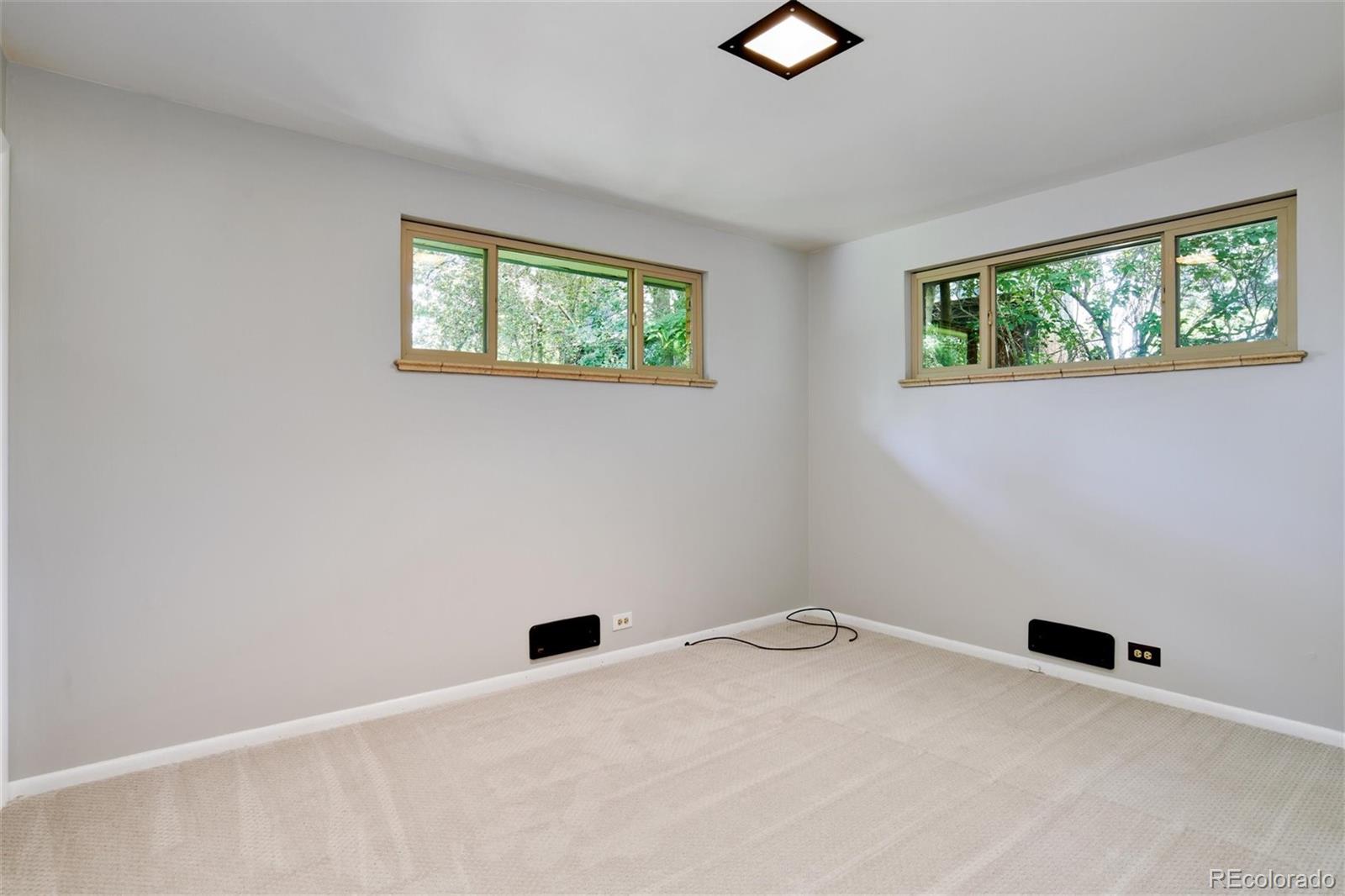 3225 Vance Street Wheat Ridge, CO 80033 - Photo 12 of 29 an empty room with windows