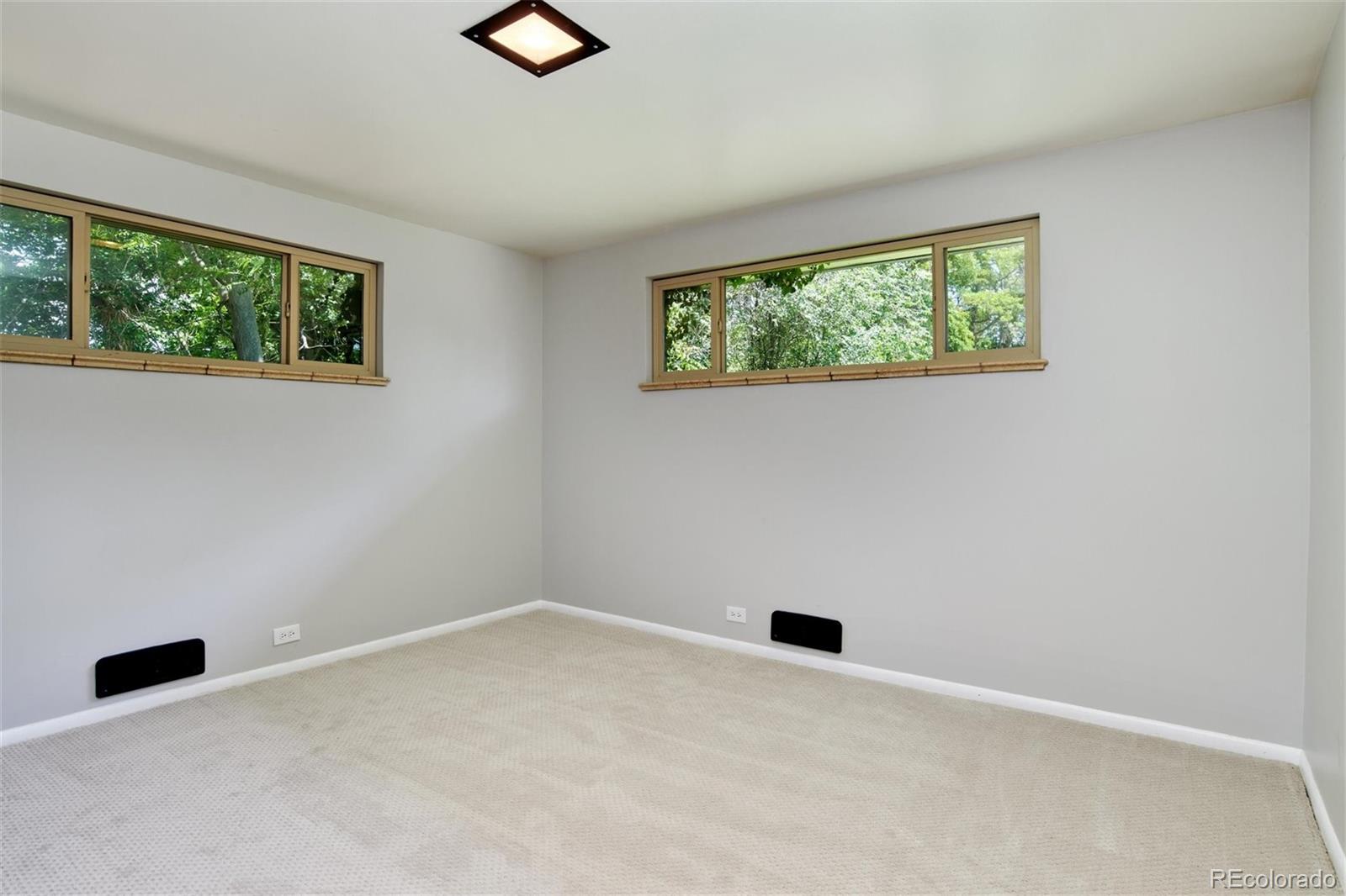 3225 Vance Street Wheat Ridge, CO 80033 - Photo 14 of 29 an empty room with a window