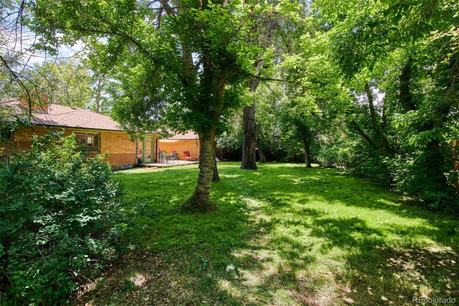3225 Vance Street Wheat Ridge, CO 80033 - Photo 26 of 29 a view of green field with a tree