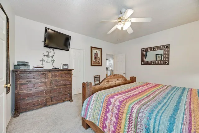 a bathroom with a double vanity sink mirror and bathtub