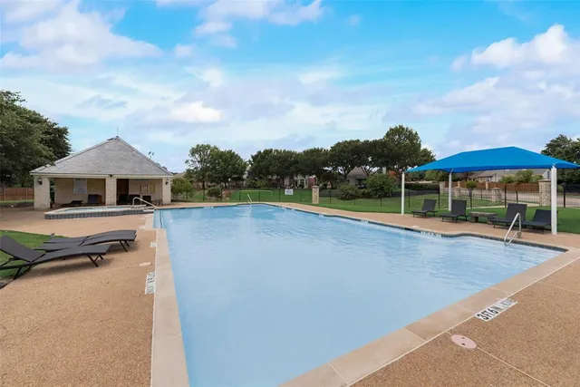 a view of a lake with a yard