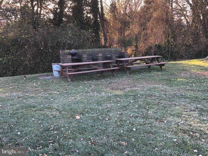 4701 Pennell Road, Unit H3 Aston, PA 19014 - Photo 18 of 18 a view of a yard with wooden fence