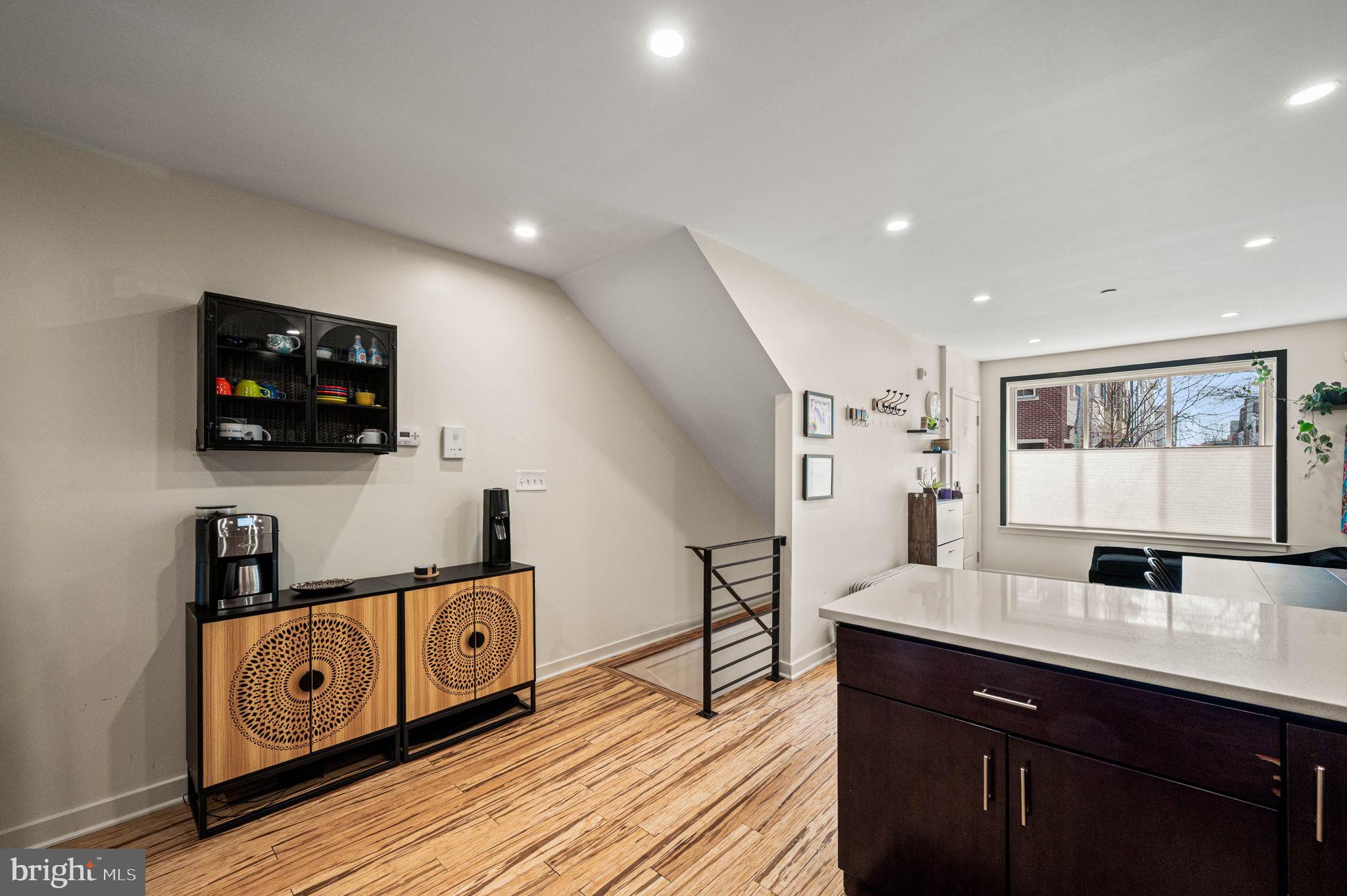 1825 Carpenter Street, Unit A Philadelphia, PA 19146 - Photo 13 of 25 a kitchen with stainless steel appliances granite countertop a sink and cabinets