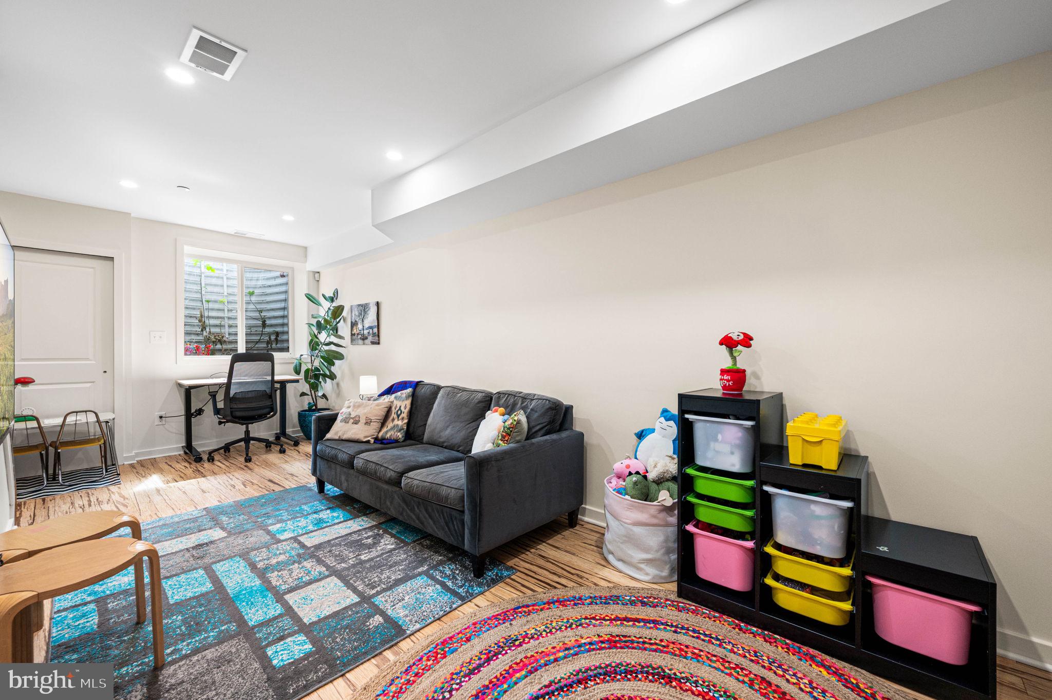1825 Carpenter Street, Unit A Philadelphia, PA 19146 - Photo 16 of 25 a living room with furniture