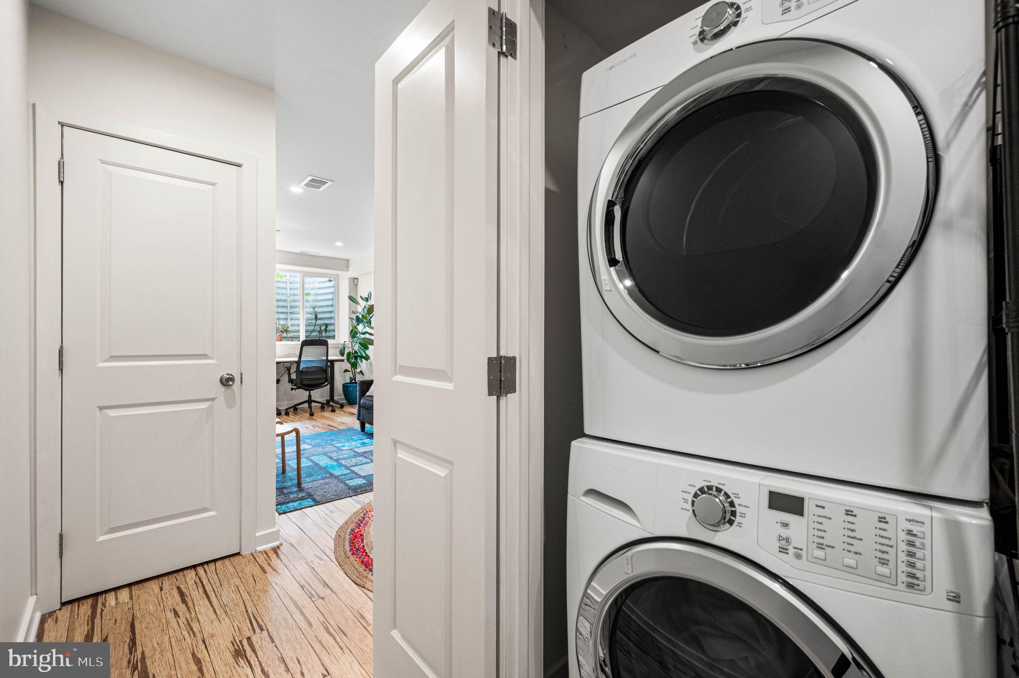 1825 Carpenter Street, Unit A Philadelphia, PA 19146 - Photo 18 of 25 a view of a hallway with washer and dryer