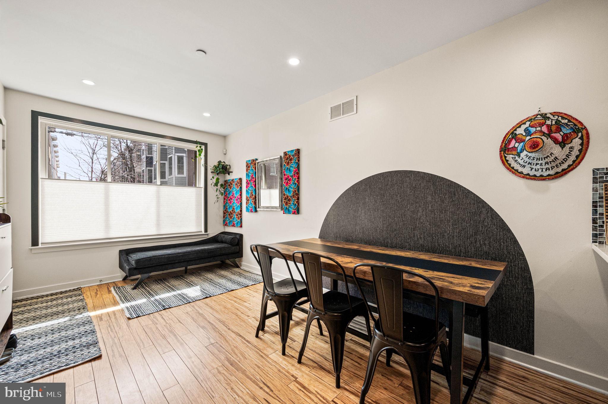 1825 Carpenter Street, Unit A Philadelphia, PA 19146 - Photo 4 of 25 a living room with furniture and a wooden floor