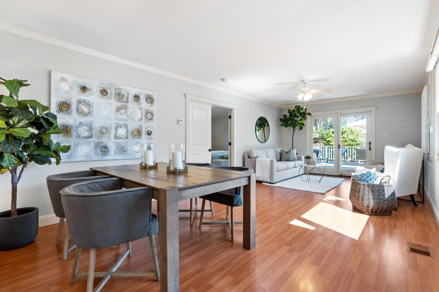 132 Bancroft Road Burlingame, CA 94010 - Photo 12 of 39 a view of a dining room with furniture and wooden floor