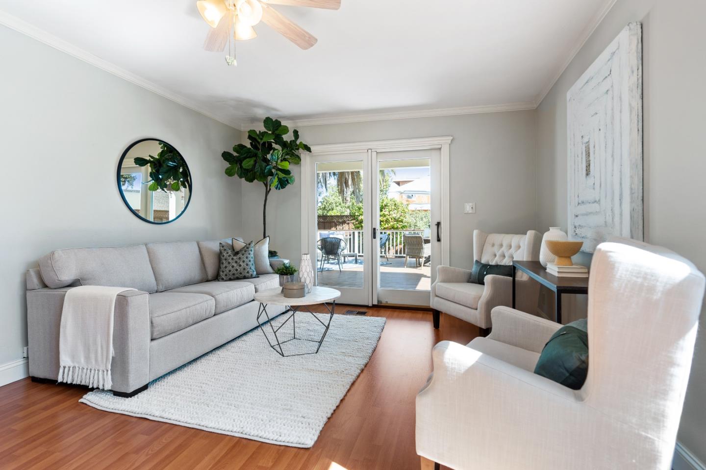 132 Bancroft Road Burlingame, CA 94010 - Photo 13 of 39 a living room with furniture a table and a large window