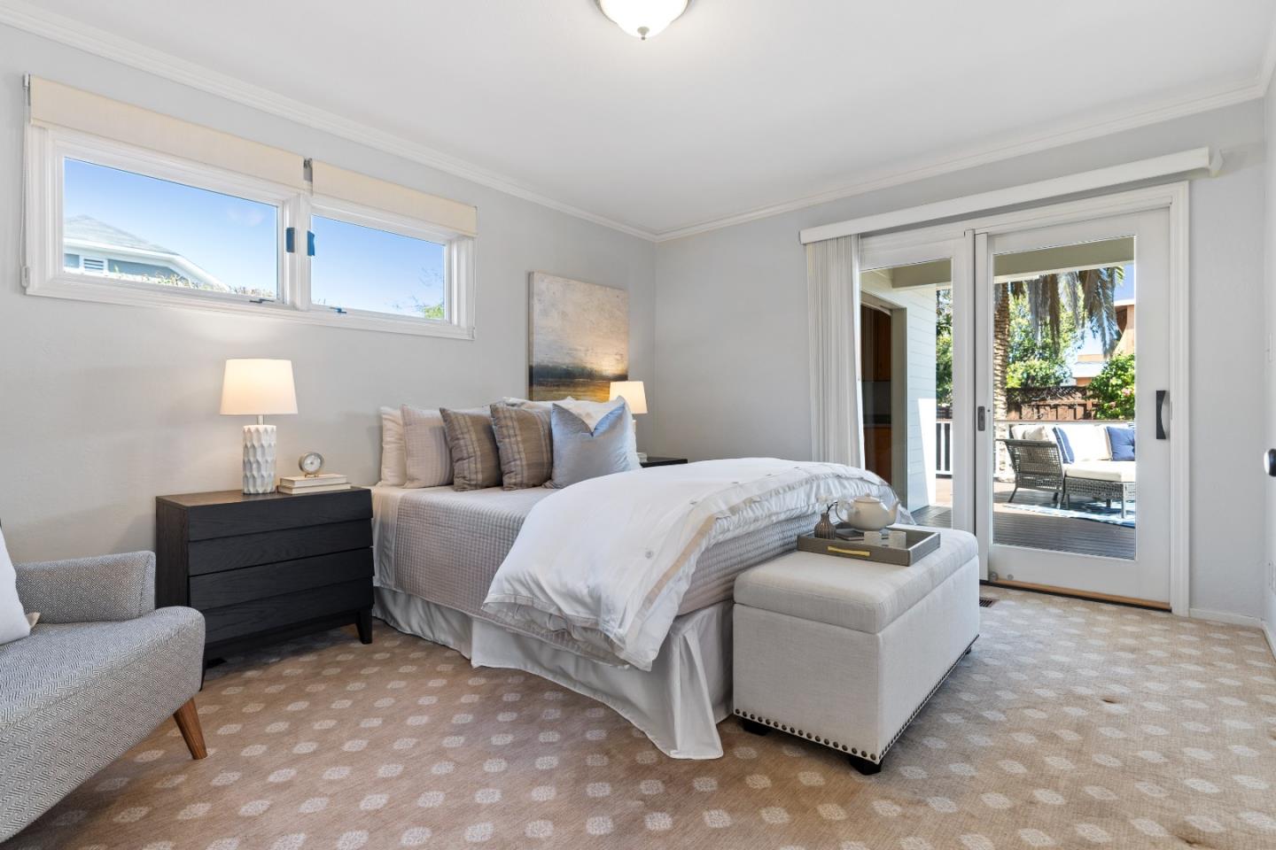 132 Bancroft Road Burlingame, CA 94010 - Photo 17 of 39 a spacious bedroom with a bed and a couch