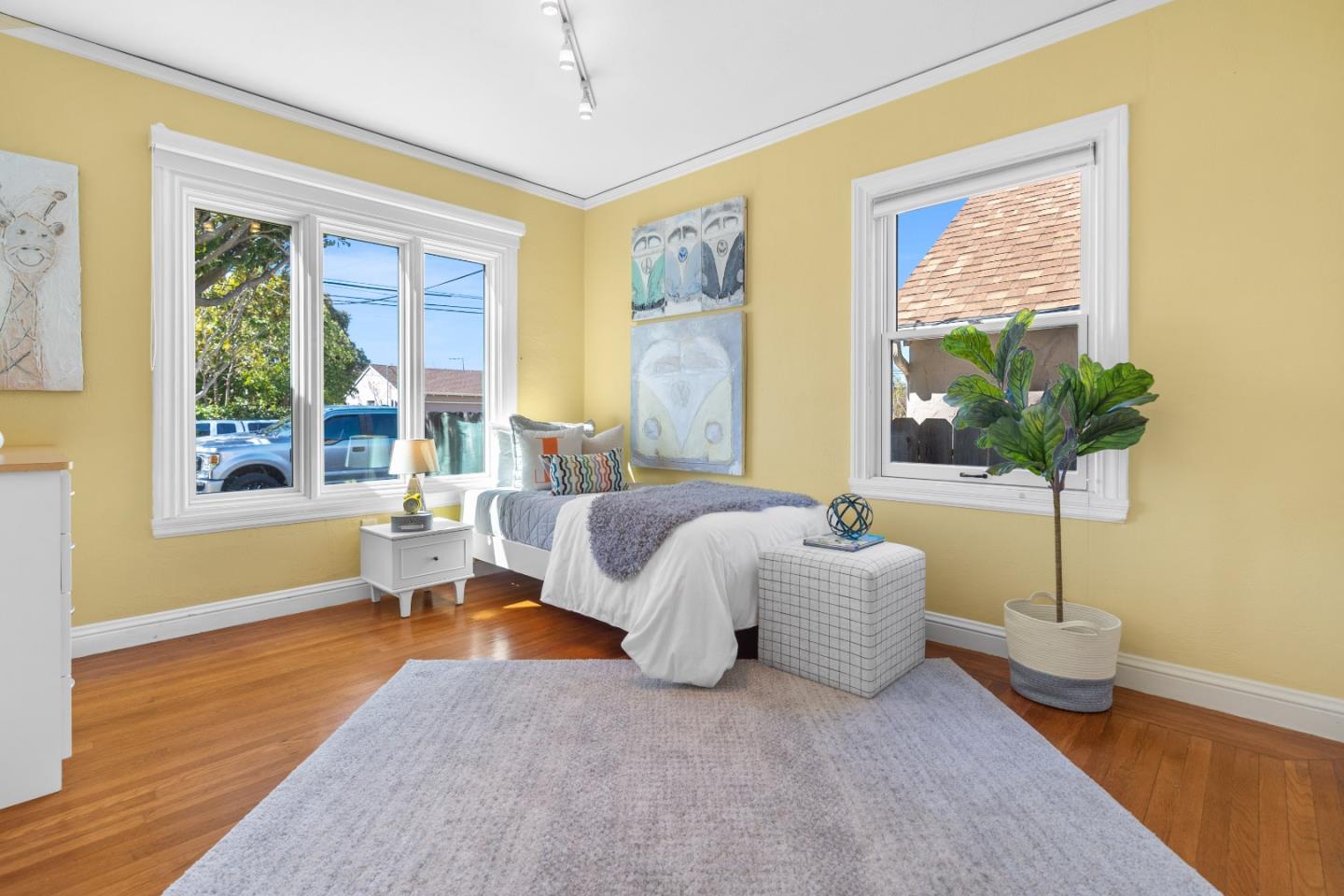 132 Bancroft Road Burlingame, CA 94010 - Photo 22 of 39 a living room with furniture and a large window