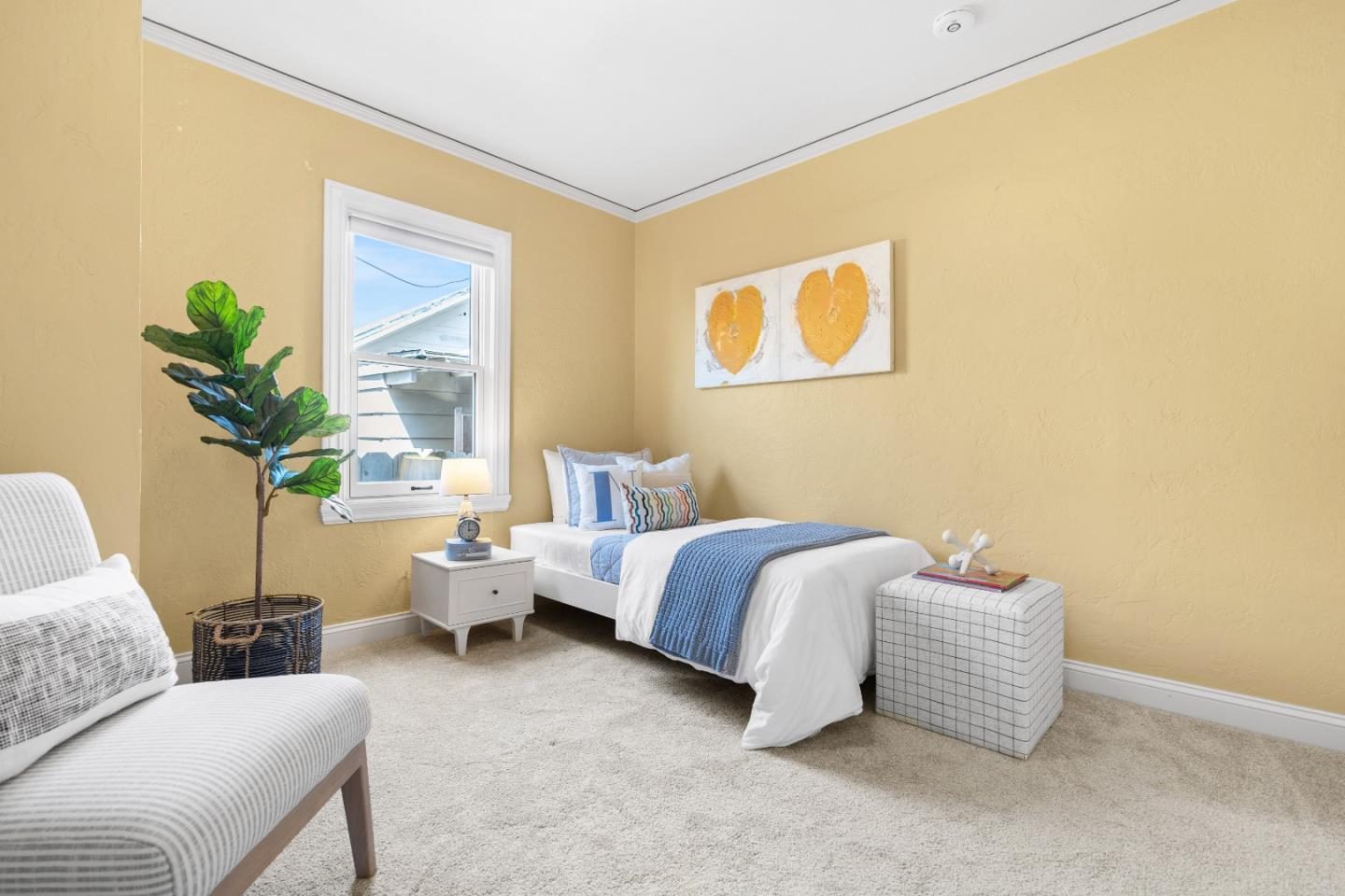132 Bancroft Road Burlingame, CA 94010 - Photo 26 of 39 a spacious bedroom with a bed and a couch