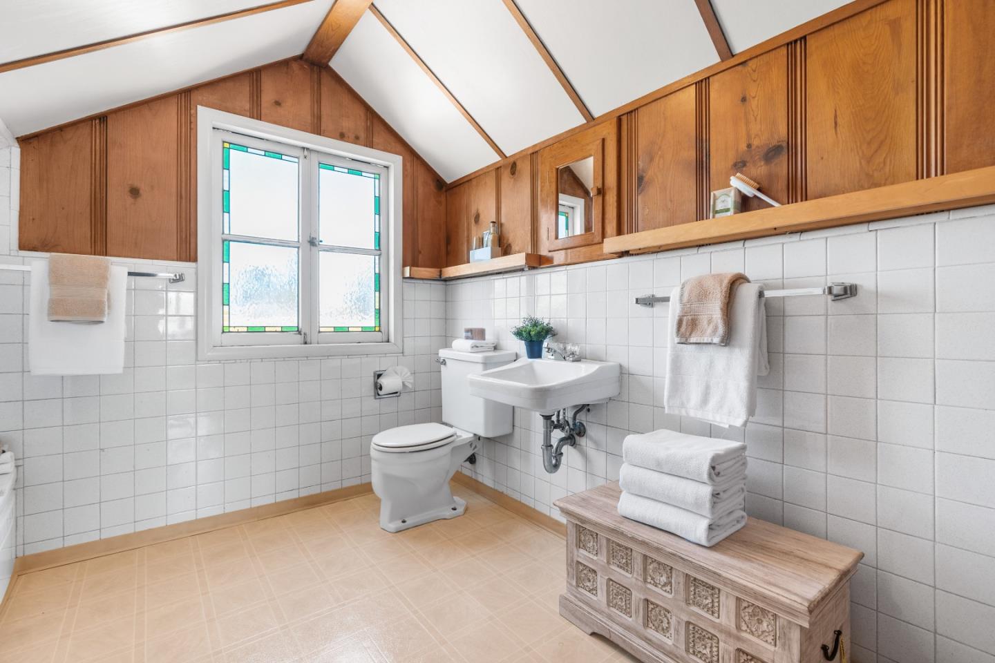 132 Bancroft Road Burlingame, CA 94010 - Photo 28 of 39 a bathroom with a sink a toilet and shower