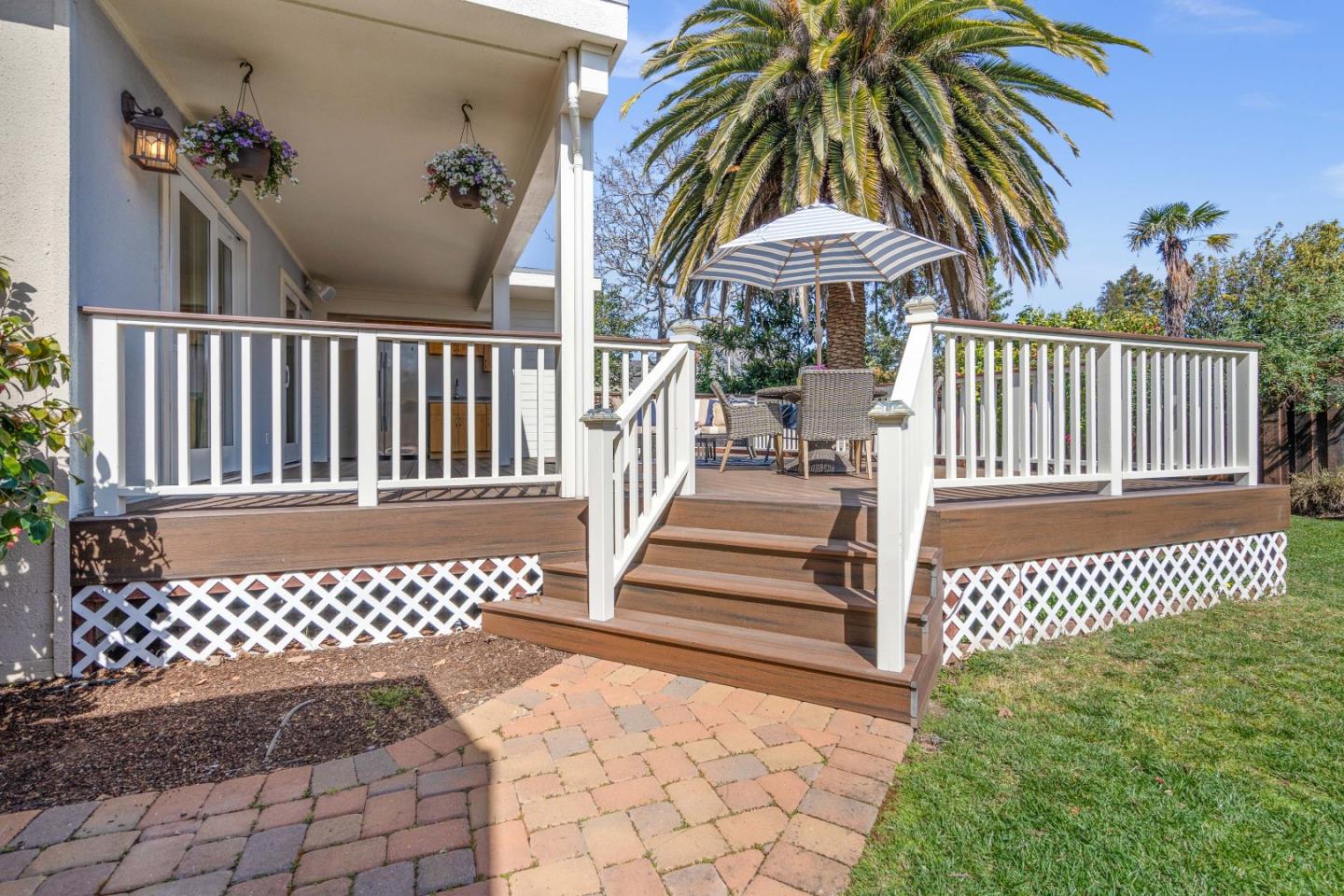 132 Bancroft Road Burlingame, CA 94010 - Photo 29 of 39 a view of a house with a small yard and furniture