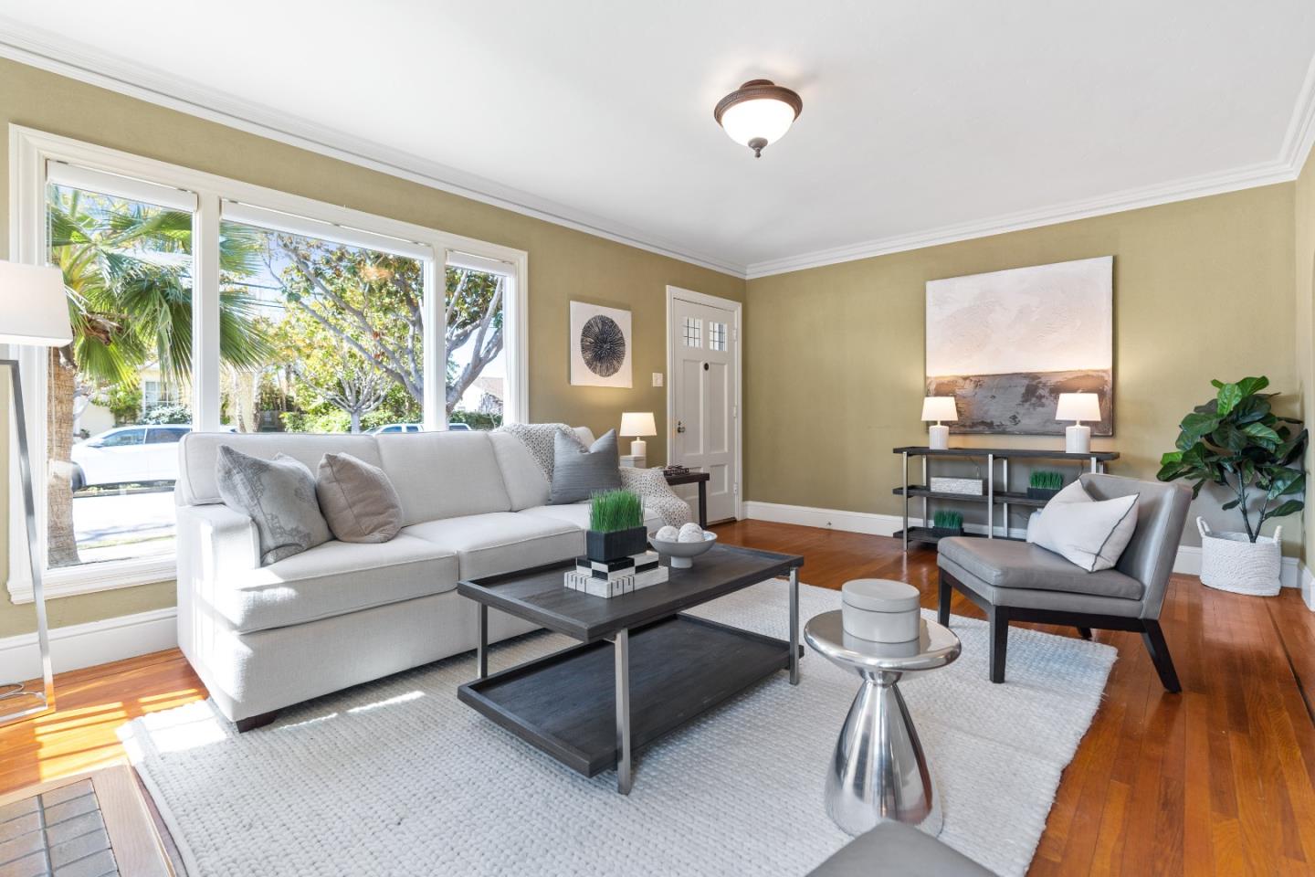 132 Bancroft Road Burlingame, CA 94010 - Photo 4 of 39 a living room with furniture and a large window