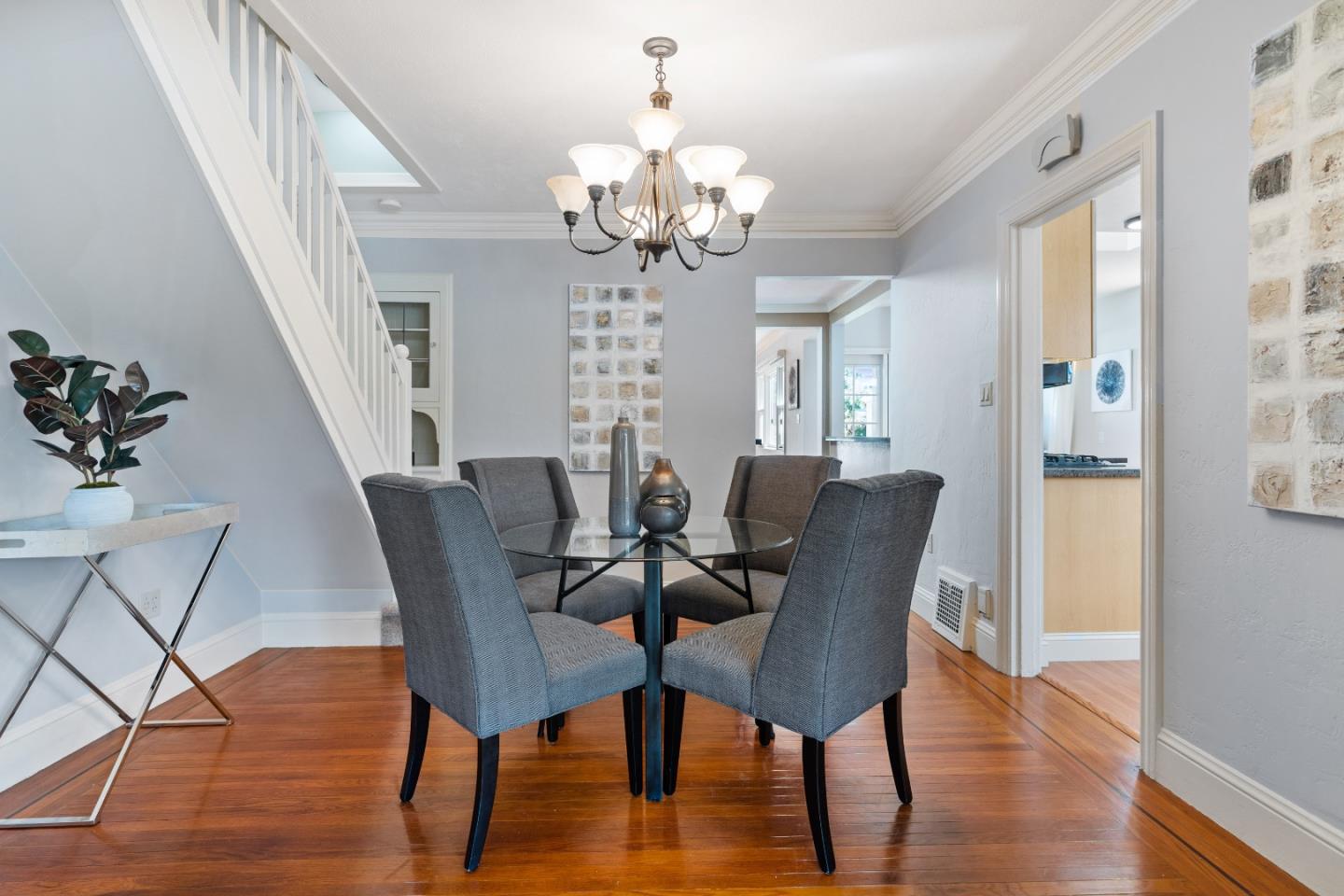 132 Bancroft Road Burlingame, CA 94010 - Photo 5 of 39 a view of a dining room with furniture and wooden floor