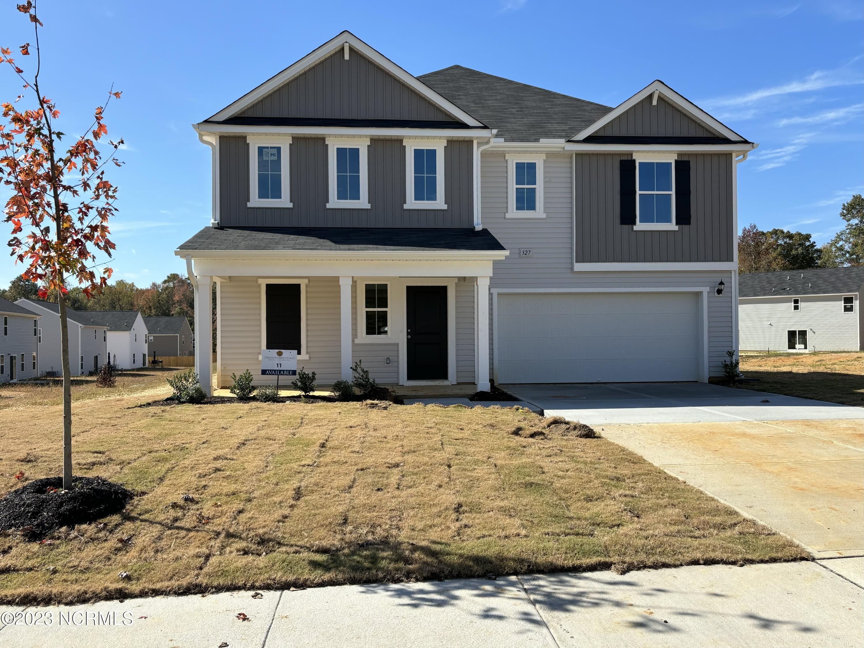 327 Riley Way Spring Hope, NC 27882 - Photo 1 of 23 11 with garage door