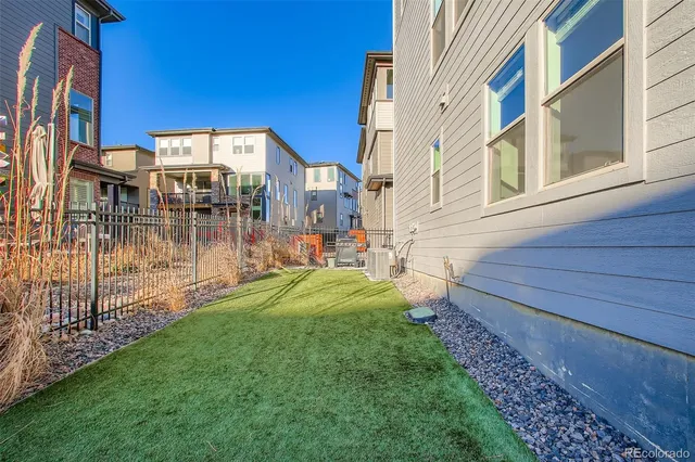 a view of a building with a yard