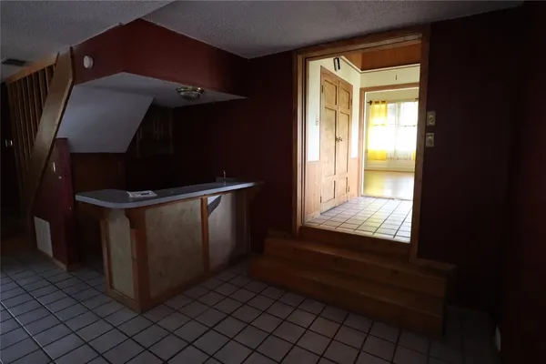 a kitchen with a stove and a microwave