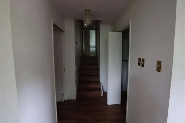 a room with a sink and a mirror