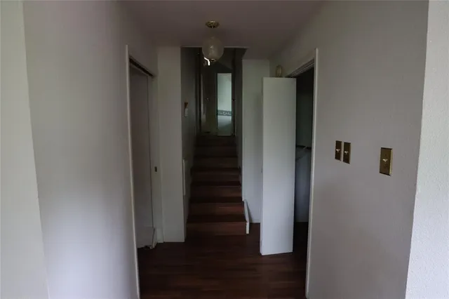 a room with a sink and a mirror