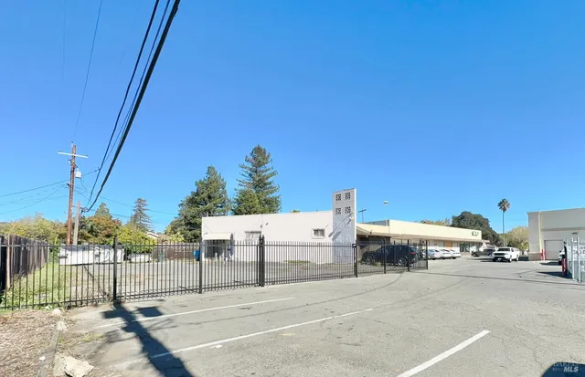 a view of a cars parked in front of a building