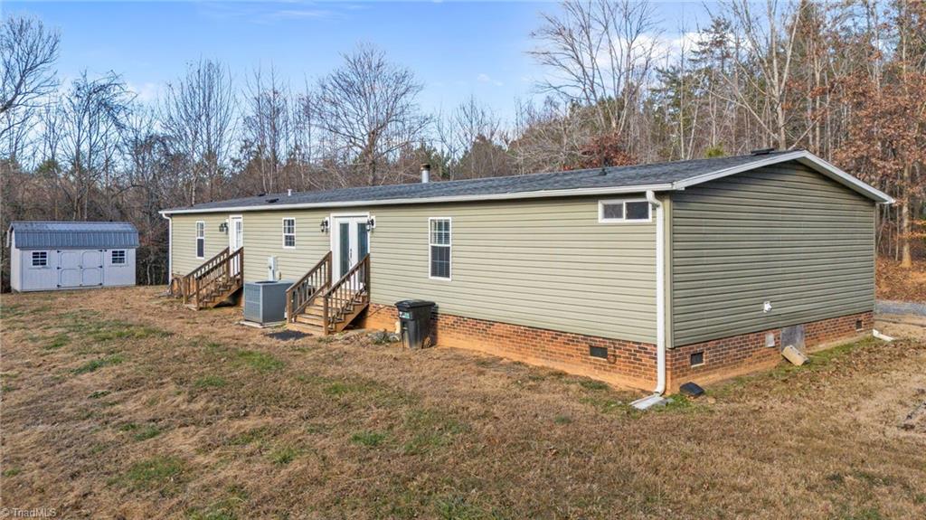 Looking for a home surrounded my mature trees? This checks the box!