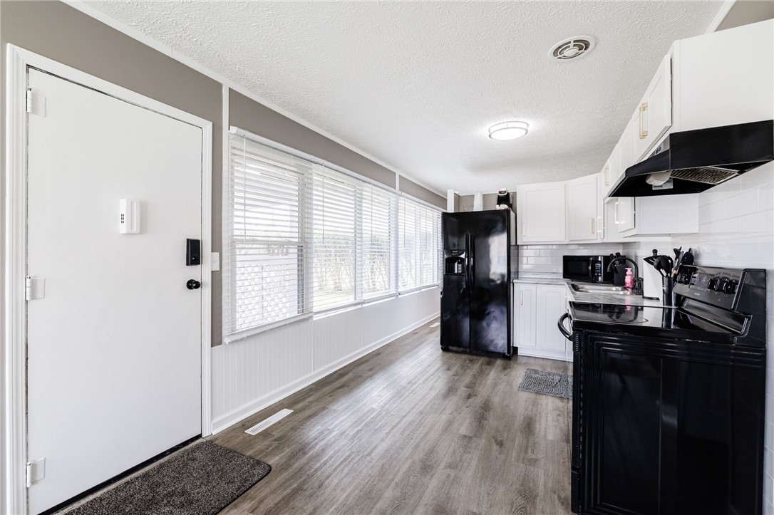 199 Castle Road Henrietta, NY 14623 - Photo 3 of 22 Step into bright, updated eat-in kitchen