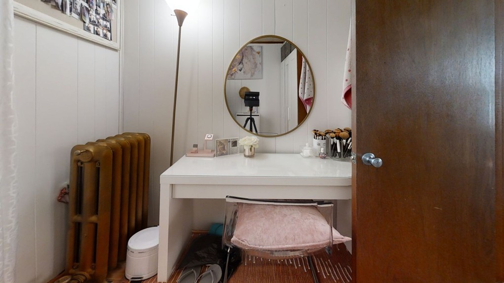49 Braeburn Road Boston, MA 02136 - Photo 3 of 18 a bathroom with a toilet mirror and a sink