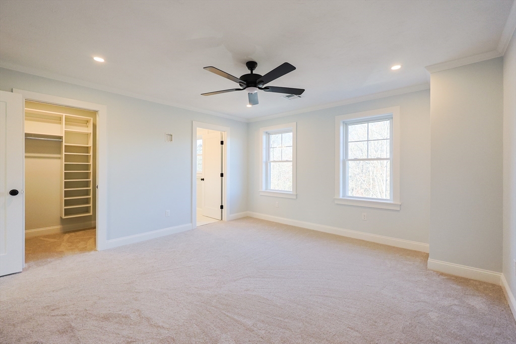 58 Baltic Street, Unit 58 Attleboro, MA 02703 - Photo 20 of 34 an empty room with windows and fan