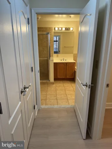 a bathroom with a tub and a sink