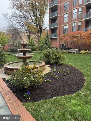 a view of a garden with an buildings