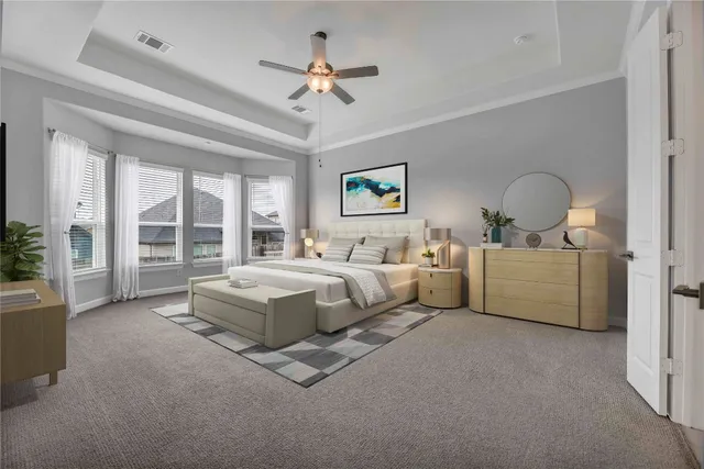 a spacious bedroom with a bed a chandelier and a large window