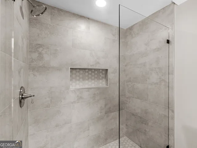 a bathroom with a sink and mirror