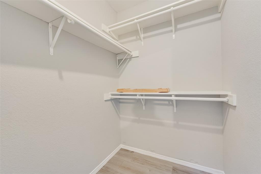 903 Ragland Drive Cedar Hill, TX 75104 - Photo 22 of 33 a view of an empty walk in closet