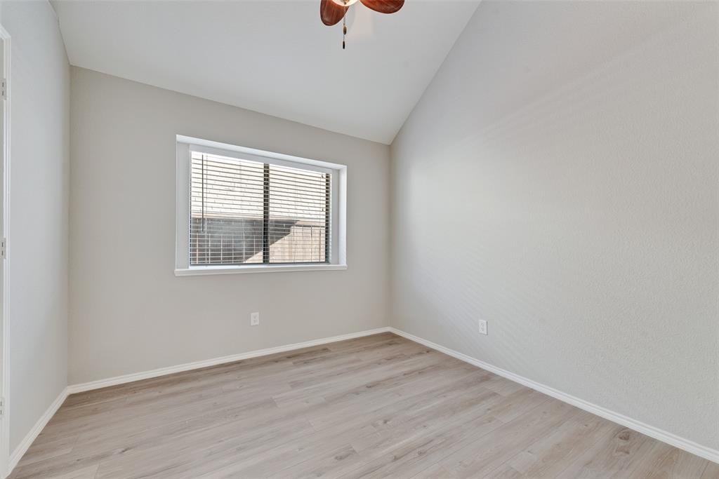 903 Ragland Drive Cedar Hill, TX 75104 - Photo 24 of 33 wooden floor in an empty room with a window