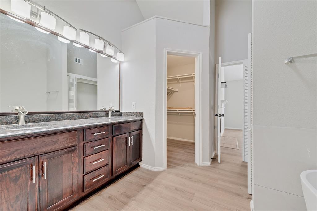 903 Ragland Drive Cedar Hill, TX 75104 - Photo 27 of 33 a bathroom with a granite countertop sink mirror and