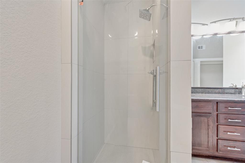 903 Ragland Drive Cedar Hill, TX 75104 - Photo 30 of 33 a bathroom with a granite countertop sink and a mirror