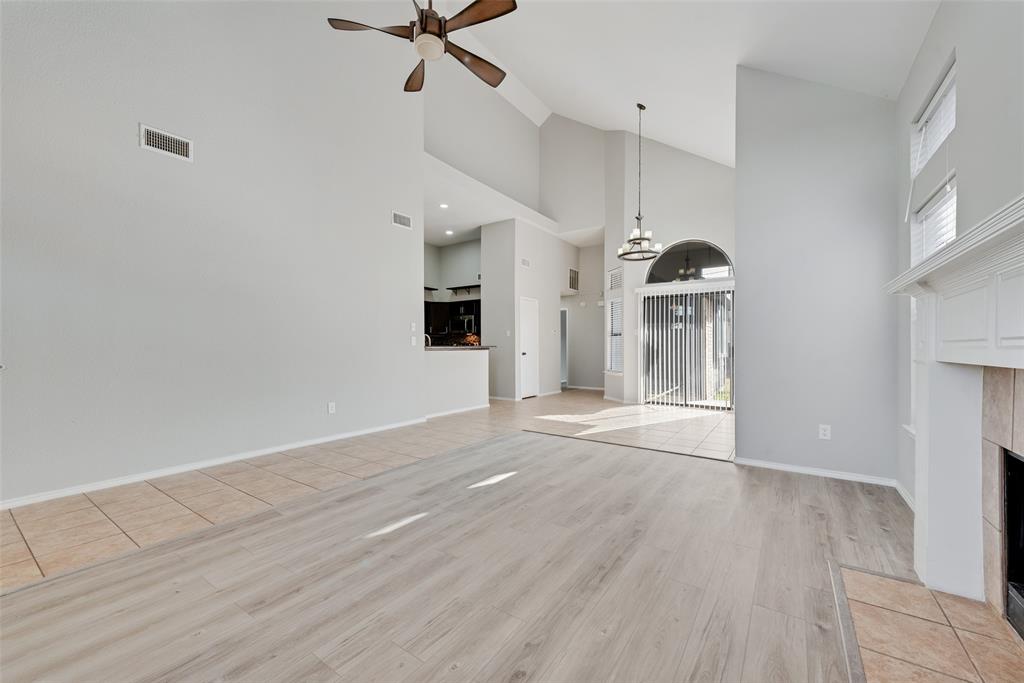 903 Ragland Drive Cedar Hill, TX 75104 - Photo 5 of 33 a view of empty room with wooden floor and fan