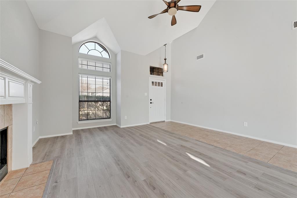 903 Ragland Drive Cedar Hill, TX 75104 - Photo 10 of 33 wooden floor in an empty room with a window