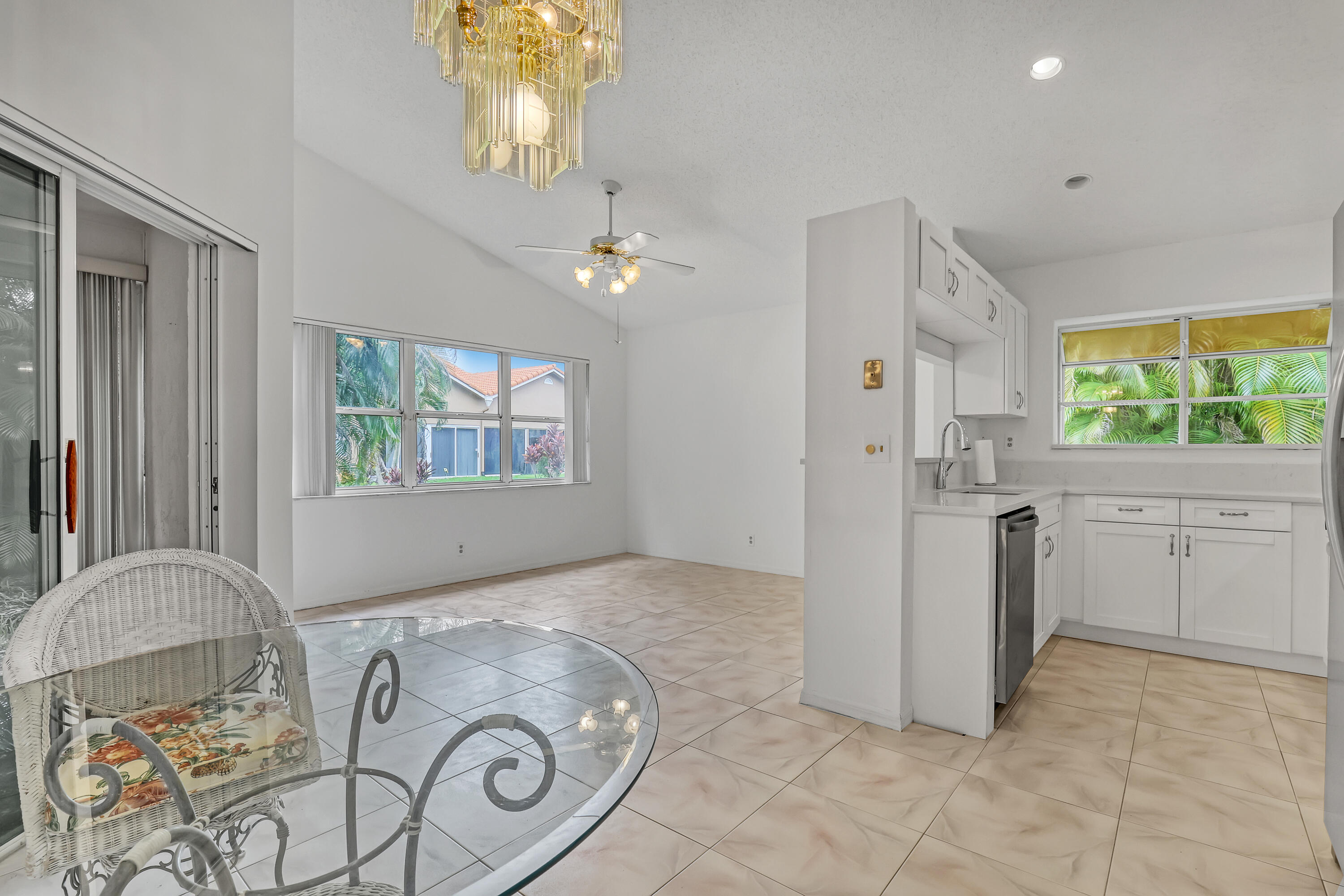 11120 Rios Road Boca Raton, FL 33498 - Photo 11 of 36 a view of a livingroom with furniture window and wooden floor